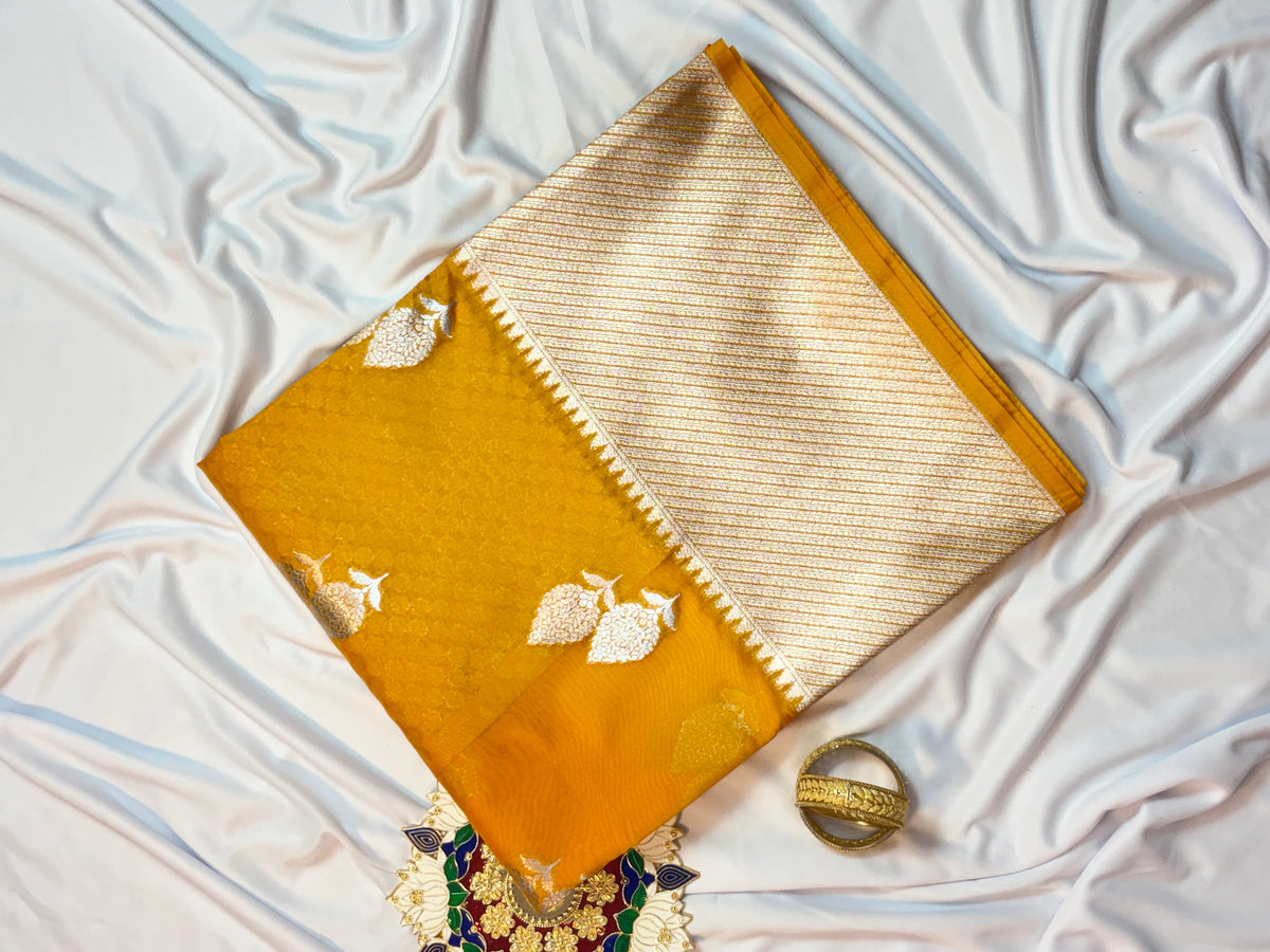Vibrant Yellow Dupion Silk Saree with Silver Zari Leaf Motifs & Temple Border
