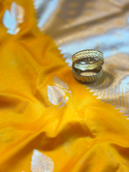 Vibrant Yellow Dupion Silk Saree with Silver Zari Leaf Motifs & Temple Border