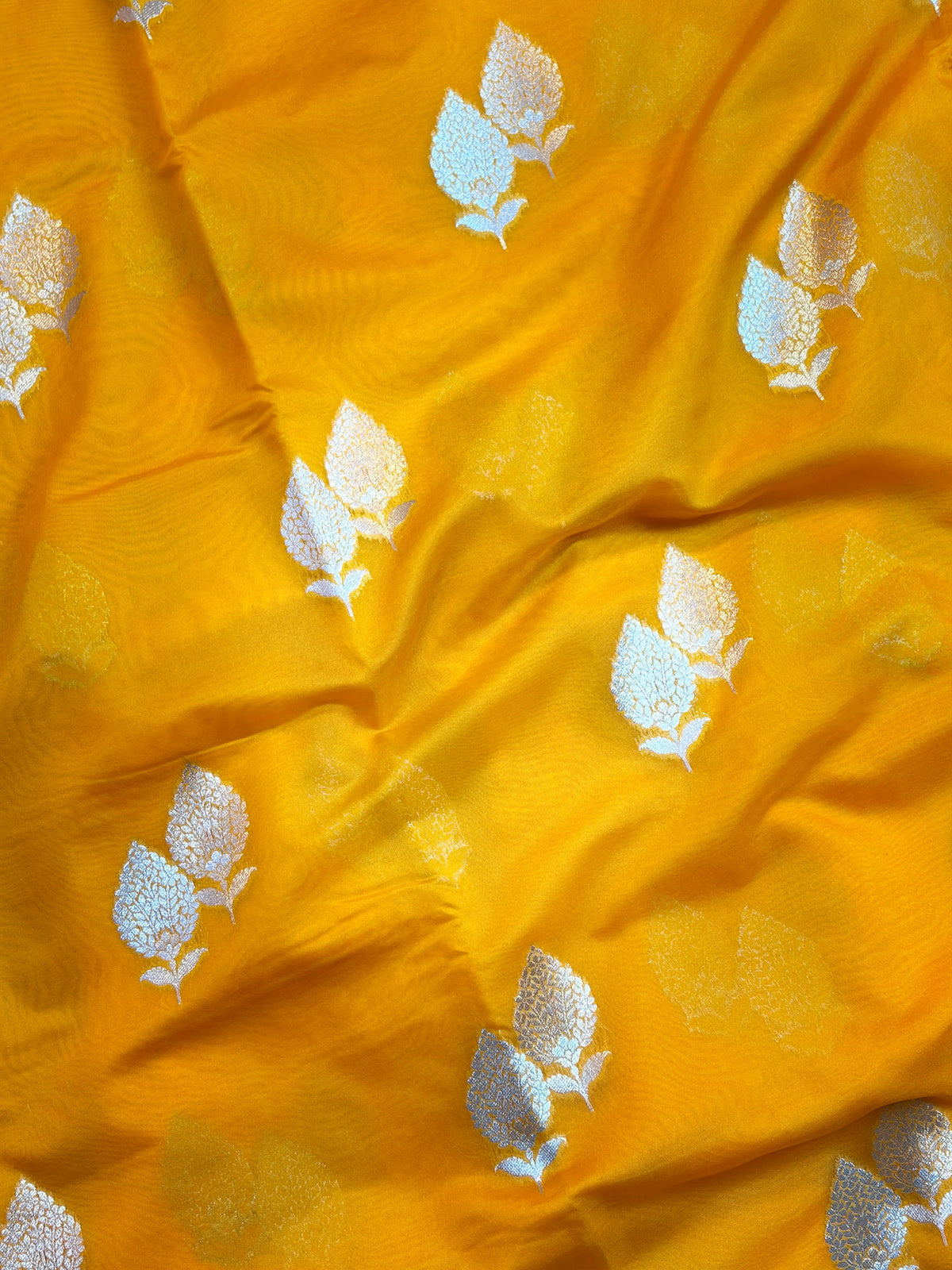Vibrant Yellow Dupion Silk Saree with Silver Zari Leaf Motifs & Temple Border